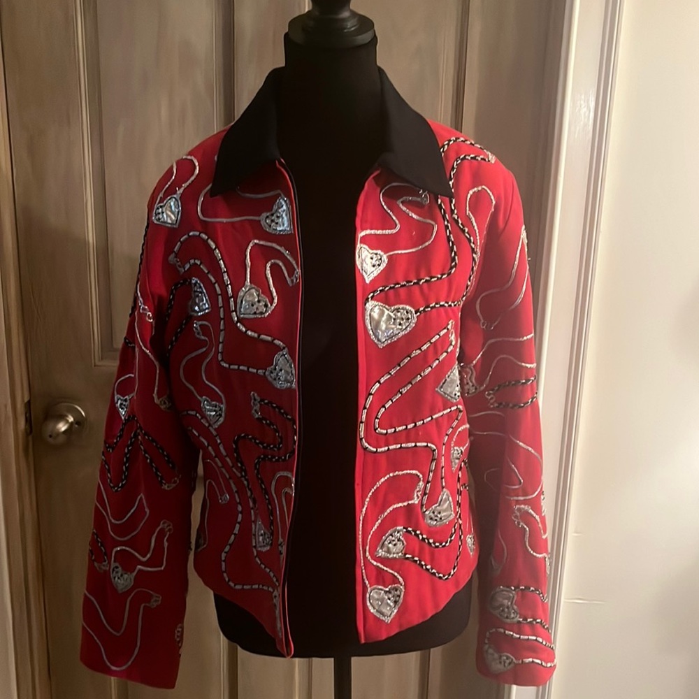 Adorable, red zip up jacket